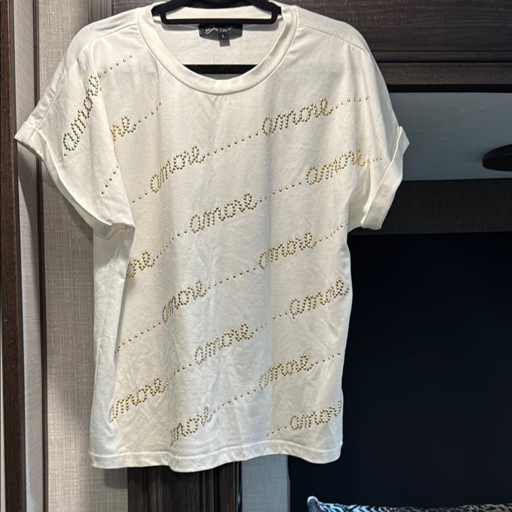 Chic White Top with Gold Accents